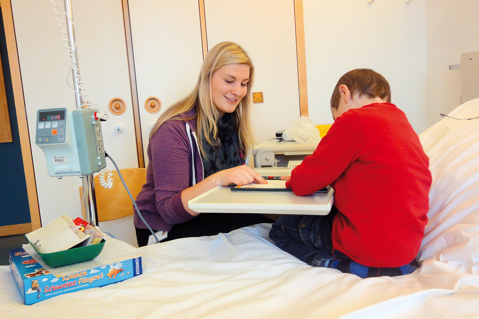 Betreuerin mit krebskrankem Kind